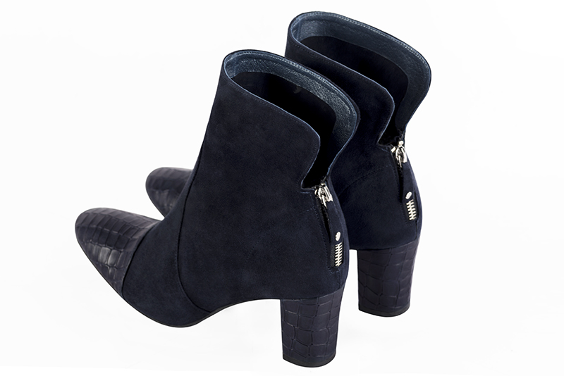 Navy blue women's ankle boots with a zip at the back. Round toe. Medium block heels. Rear view - Florence KOOIJMAN